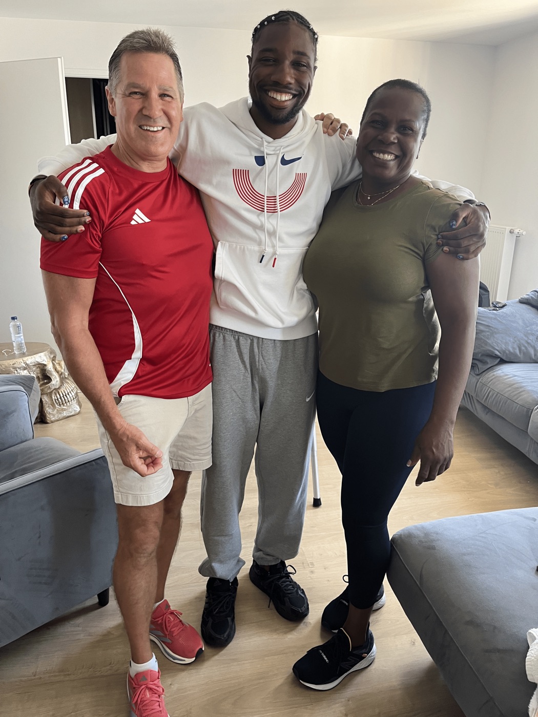 Dr. Obetz with Noah Lyles and Mona Monplaisir in Paris